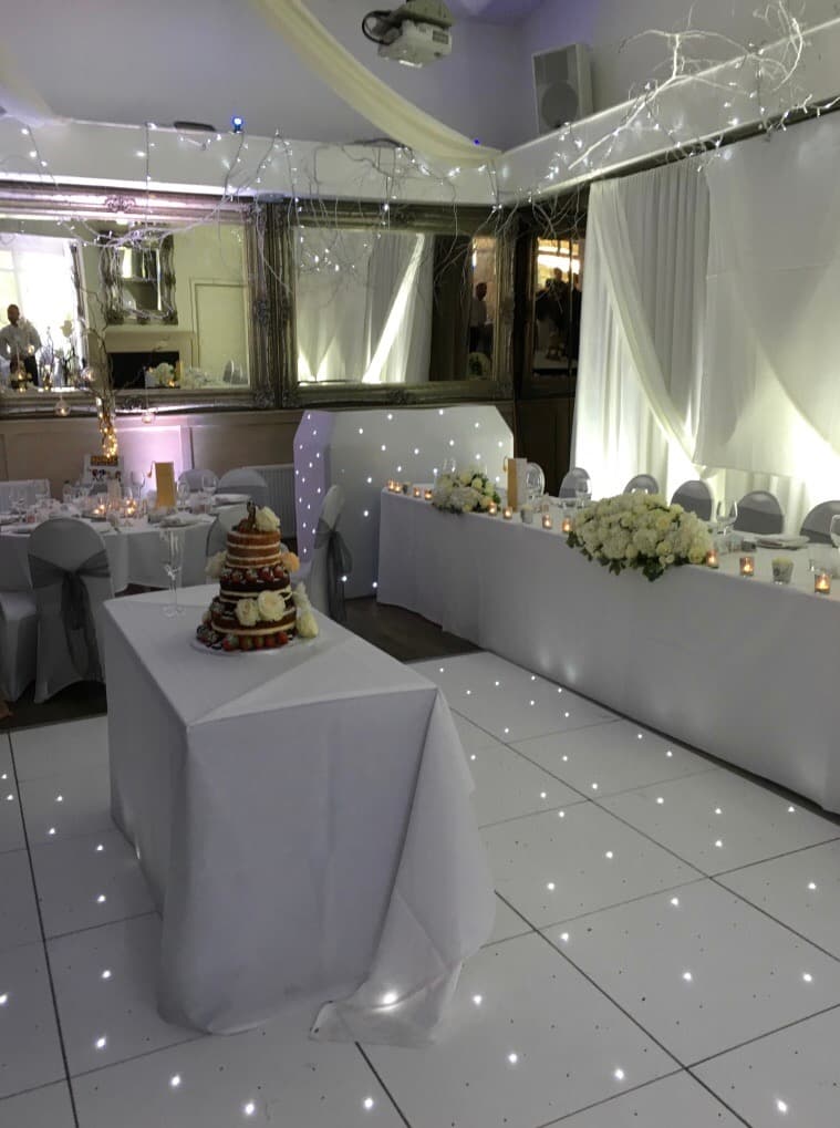 wedding reception with white dj booth