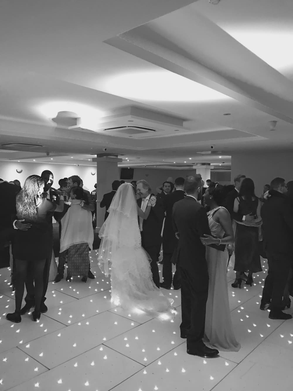 bride dancing with her father on the dancefloor